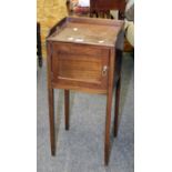 A George III mahogany tray top night cupboard with a single cupboard door and squared supports, 35cm