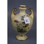 A Royal Worcester vase of amphora shape, Design No 1076, decorated with spring flowers, butterfly