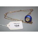 A silver and enamel pendant ball watch, the spherical two part guilloche enamel case with cream band