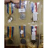A 1914-1915 trio of medals to 2580 Private H Holloway, Royal Warwickshire Regiment, and another
