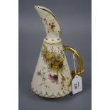 A Royal Worcester ewer of fluted conical form, design number 1361, with elongated spout and curved