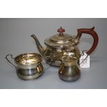 A silver three piece tea service, of bellied form, Chester 1927