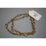 A 9ct gold fancy oval link chain, 58cm long