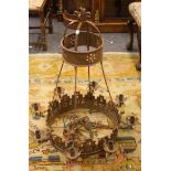 A 19th century wrought iron hanging coronet chandelier with Gothic decoration, 93cm high