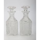 A good pair of heavy 20th century cut crystal decanters and stoppers, each with slice cut neck and