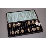 George Unite, a cased set of twelve silver apostle teaspoons, each with wrythen handle, Birmingham