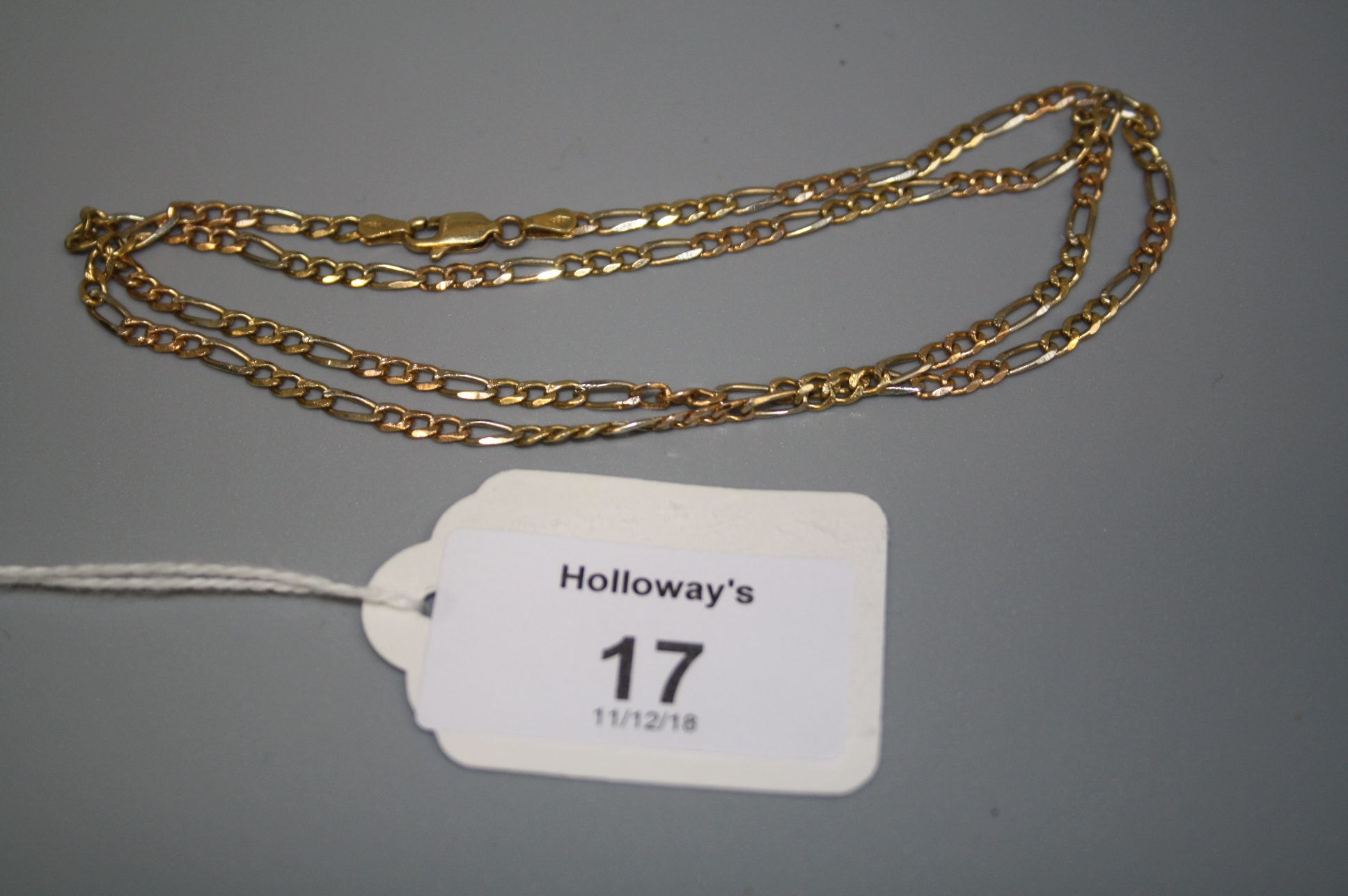 A two colour fancy curb pattern necklace, marked '750', 51 cm length