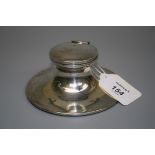 A silver capstan inkwell, deficient of liner, Birmingham 1910