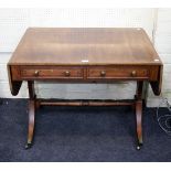 A George III zebrano banded and satin wood and ebony strung mahogany sofa table, fitted two frieze