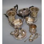 A pair of silver plated syphon stands, each with pierced swag decorated body on reeded supports