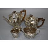 Charles Stuart Harris, a silver four piece tea and coffee service, each of oval form with demi-