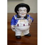 A 19th century continental porcelain Jolly Jack-Tar figural tobacco jar, painted in colours, 24cm