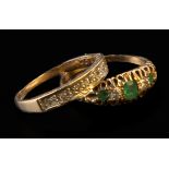 A late Victorian emerald and diamond half hoop ring, the graduated mixed cut emeralds and diamonds