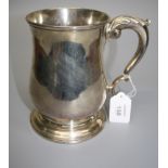 John Swift, a baluster form silver tankard, with acanthus thumb piece to the scrolled handle, on