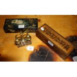 A pair of swinging brass horse bells, on a Tonbridge ware plinth, a Tonbridge ware cribbage box, a