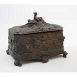 A 19th century possibly Austrian brown patinated bronze casket, fashioned as a timber clad chest,