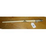 A Victorian ivory conductor's baton with white metal mounts and inscription: 'Presented to E.