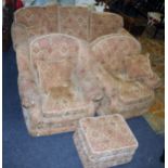 A good quality three piece drawing room suite, and matching footstool, upholstered with stepped