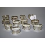 A set of twelve plain oval silver serviette rings, stamped Stirling .925