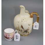 A large Royal Worcester flatback jug, decorated with spring flowers and butterflies on a blush ivory