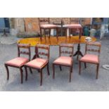 A set of Regency brass inlaid double sabre dining chairs, with drop in seats (6), together with a