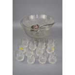 An Edinburgh crystal cut glass punch bowl, together with twelve loop handled cups and a silver
