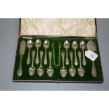 Walker and Hall, a cased set of twelve silver coffee spoons, butter knife and jam spoon, each with