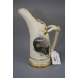 A Royal Worcester tusk handled ice jug, Design 1116, decorated with cranes in a moonlit landscape on