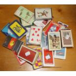 A collection of early 20th century and other playing cards, various factories