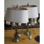 A pair of brass two arm desk lamps, 56cm high