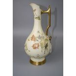 A Royal Worcester tall ewer, design number 1040, with angular scrolled handle, the baluster body