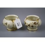 A pair of late 19th century Royal Worcester footed posy vases, decorated in shallow relief with