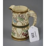 A Royal Worcester jug of cylindrical tapering form, with elephant mask handle and Japanoise