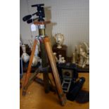 A private collection of several dozen mid 20th century and later cameras, tripods, lenses and