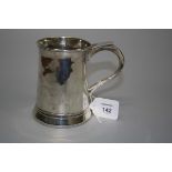 An 18th century silver half pint tankard, London 1770, marks rubbed, 12cm