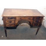 A Victorian mahogany kneehole wash stand, with turned supports, 121.5cm wide