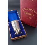 A mid 19th century cased Russian silver and gilt commemorative pedestal goblet, marking the