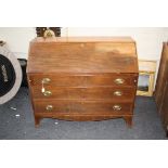 A George III mahogany fall front writing bureau with splay feet, 119cm