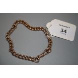 A 9ct rose gold curb pattern what chain with single clip connection