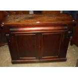 A Victorian mahogany chiffonier, the rectangular top over frieze drawer and a pair of panelled doors