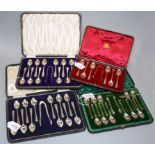 C.W.F. a cased set of twelve silver coffee spoons and tongs, each with feathered edge, Sheffield