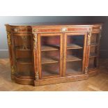 A Victorian burr walnut, amboyna, boxwood tulipwood strung and ormolu mounted credenza, the top over