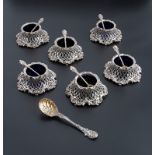 Charles Fox, a set of six silver lattice work salts, each on a spreading rococo base, with glass