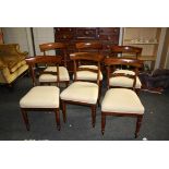 A set of six Victorian mahogany dining chairs, each with plain rail, scrolled tulip splat,