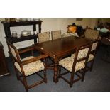 A Jacobean-style oak draw leaf refectory dining table, together with a set of six close studded