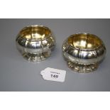 William Eaton, a pair of silver baluster salts, each with piecrust rim on a spreading petal foot,