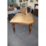 A Victorian mahogany wind-out extending dining table, the rectangular top with moulded edge and