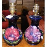 A pair of 24cm high Moorcroft pottery table lamps