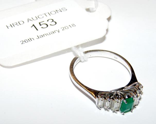 A lady's emerald and baguette cut diamond ring in