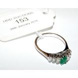 A lady's emerald and baguette cut diamond ring in